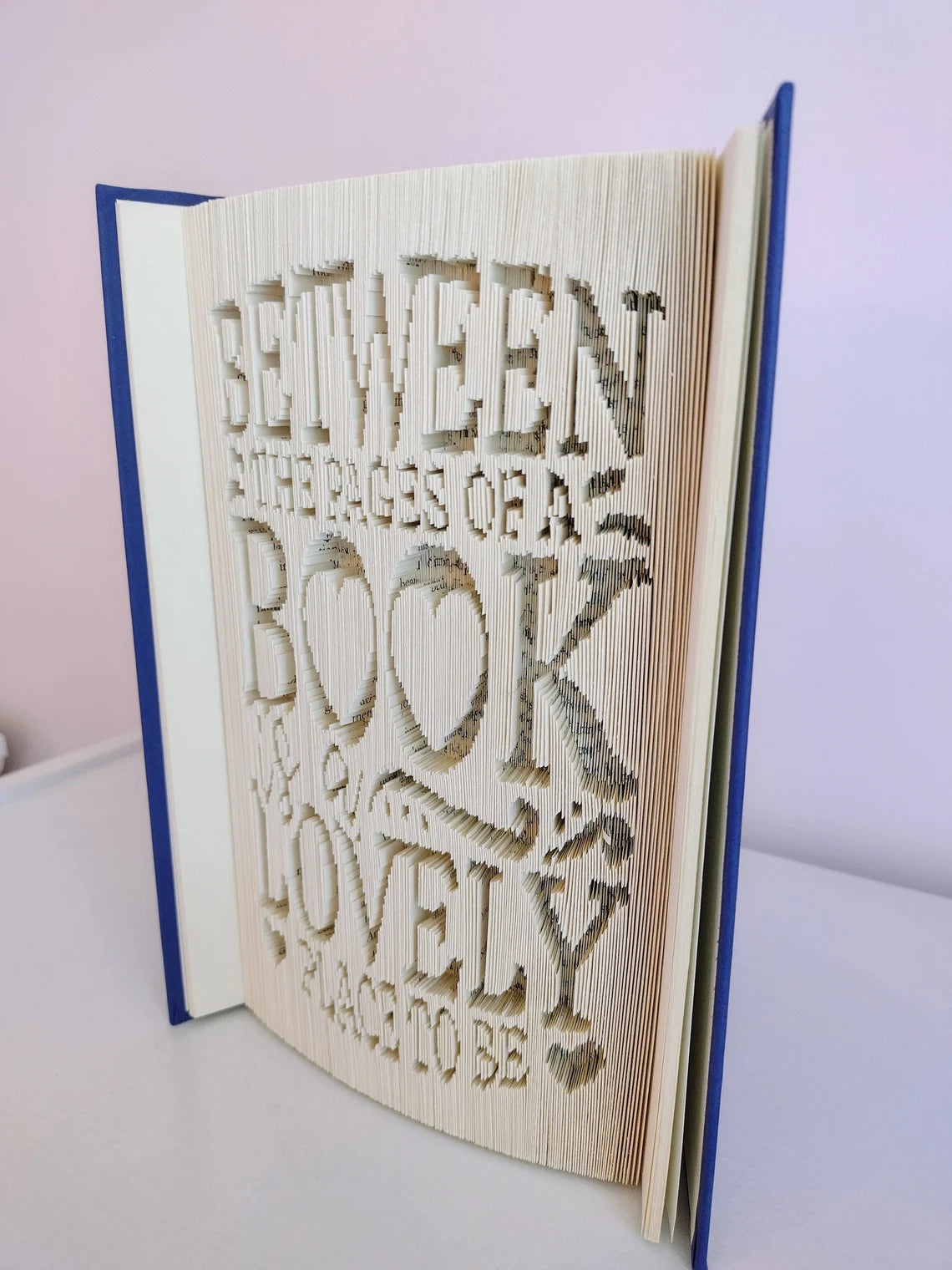 Between the Pages of a Book is a Lovely Place To Be Folded Book Art
