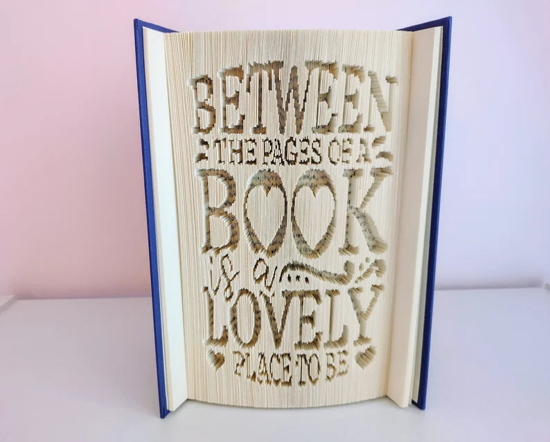 Between the Pages of a Book is a Lovely Place To Be Folded Book Art